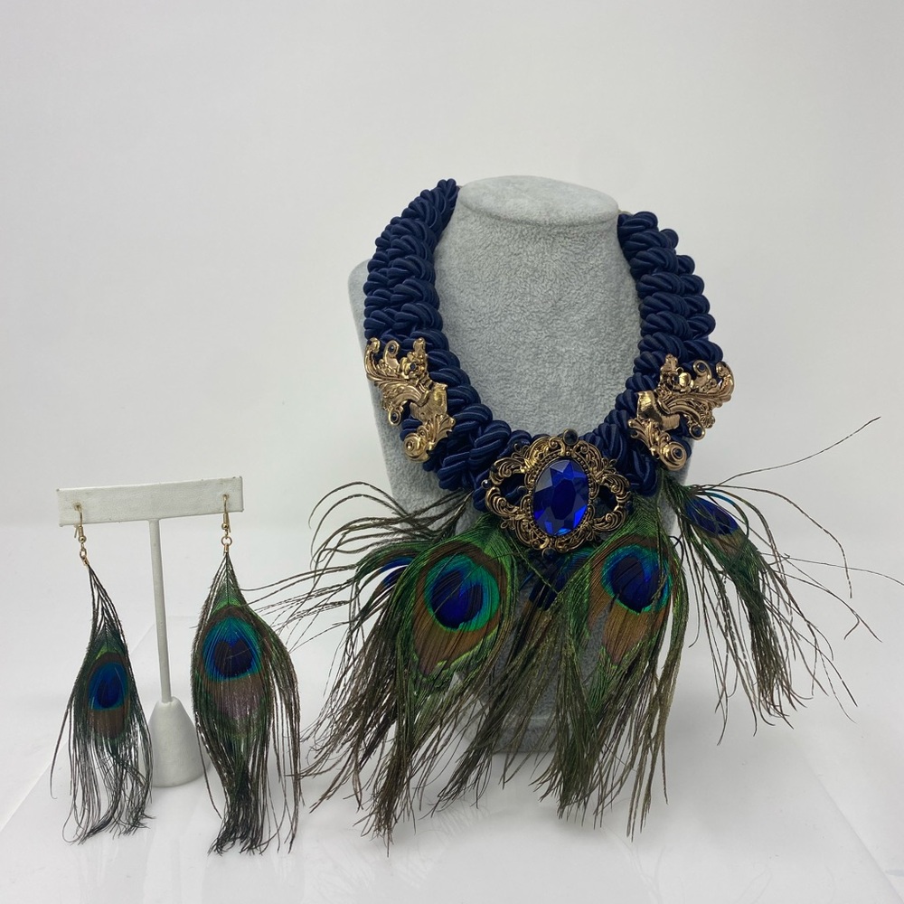 Elegant Blue and Gold Statement Necklace with Peacock Feather Accents